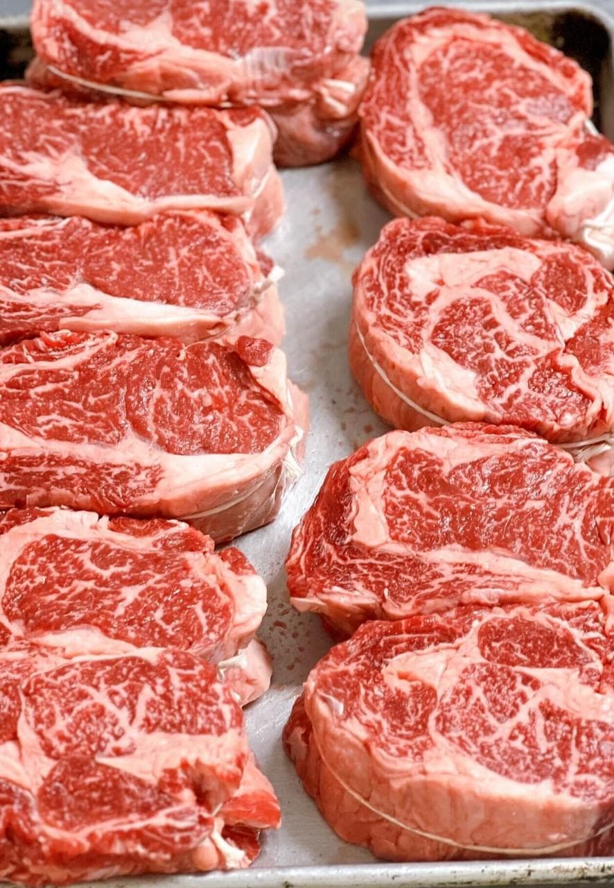 Marbled prime kosher ribeye steaks